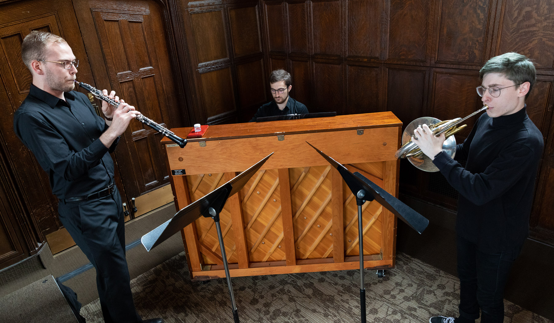 Left to right, Ian Egeberg, Ryan Senger and Jacob Nelson, students in the School of Music, performed at the breakfast hosted by the Office of Institutional Diversity and Equity. (DePaul University/Jeff Carrion)